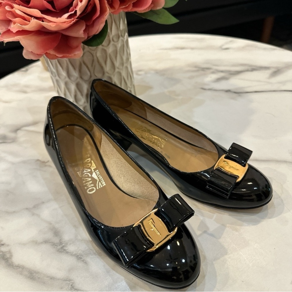 Salvatore Ferragamo Black Flats with Gold Accents